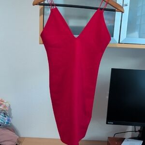 by the way. Vibrant Red Backless Dress